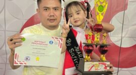 Salsabila Balqis Akbar bersama sang ayah, Baihaqi. FOTO ANANG