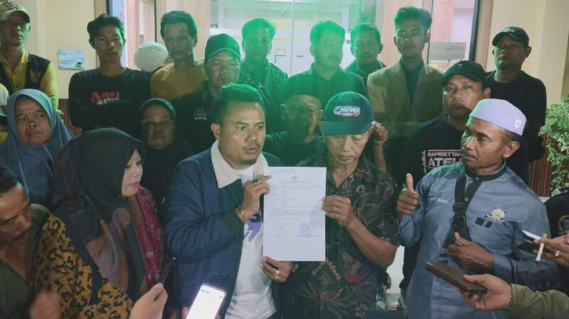 Ketua Umum AMI Baihaki saat mendampingi laporan. FOTO MITRAMEDIA