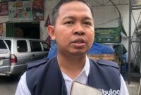 Kepala Cabang Perum Bulog Mokokerto, Muhammad Husin saat diwawancarai. (MITRAMEDIA.CO) 