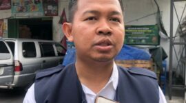 Kepala Cabang Perum Bulog Mokokerto, Muhammad Husin saat diwawancarai. (MITRAMEDIA.CO) 