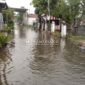 Luapan Sungai Afvoer Watudakon yang menerjang pemikuman warga. (ISTIMEWA) 